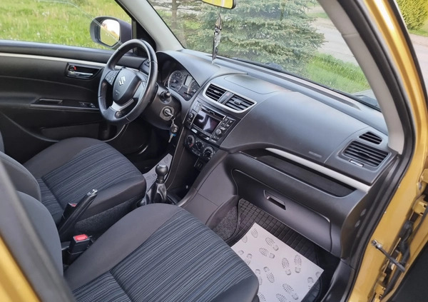 Suzuki Swift cena 35900 przebieg: 106000, rok produkcji 2014 z Gostyń małe 497